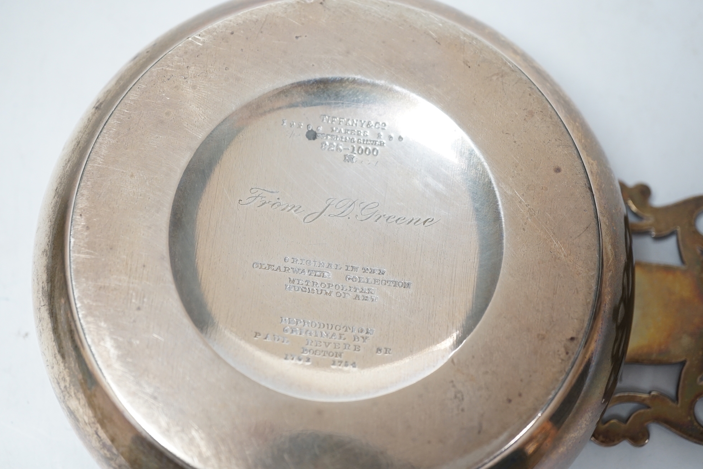 A Tiffany & Co sterling bleeding bowl, a replica of the original in the Clearwater Collection by Paul Revere, 19.3cm including handled, 7.8oz.